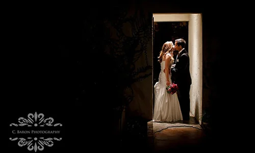 Bride and Groom Framed in a Doorway at The Bell Tower on 34th